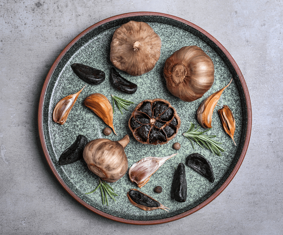 Black Garlic on a plate.